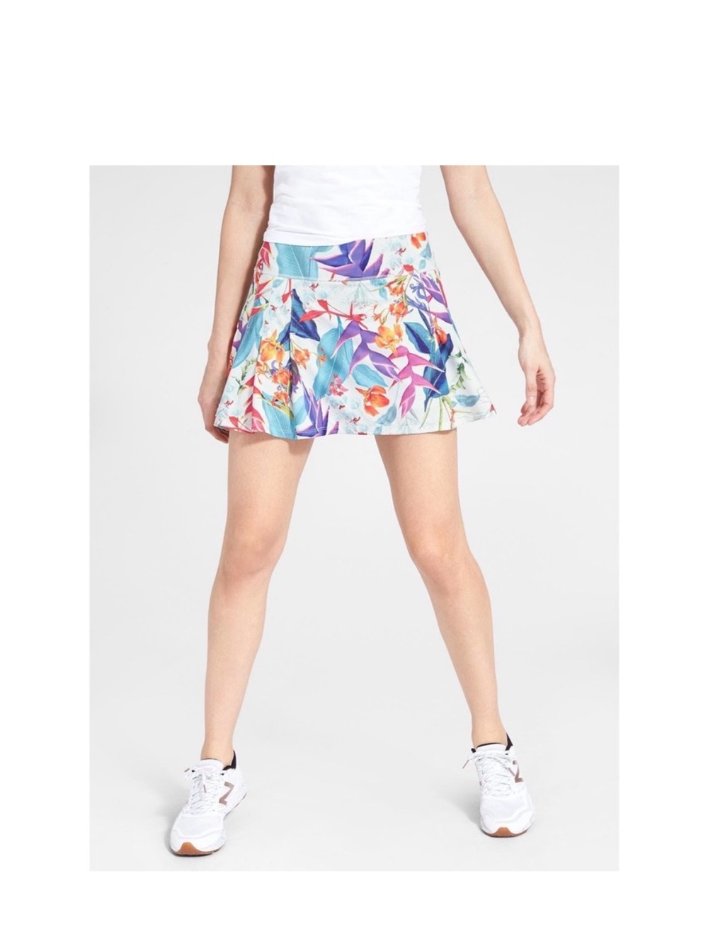 Athleta tennis skort sizeXS bright tropical floral design, inside pockets